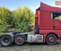 Красный МАН ТГКС, объемом двигателя 10.52 л и пробегом 800 тыс. км за 24000 $, фото 1 на Automoto.ua