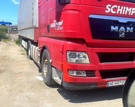 Красный МАН ТГКС, объемом двигателя 14.8 л и пробегом 850 тыс. км за 35000 $, фото 2 на Automoto.ua