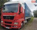 Красный МАН ТГКС, объемом двигателя 10.52 л и пробегом 940 тыс. км за 14800 $, фото 1 на Automoto.ua