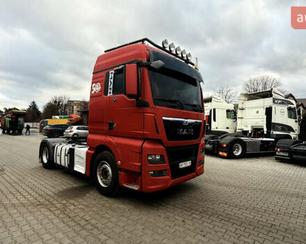 Красный МАН ТГКС, объемом двигателя 12.42 л и пробегом 980 тыс. км за 20000 $, фото 1 на Automoto.ua