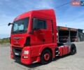 Красный МАН ТГКС, объемом двигателя 12.5 л и пробегом 863 тыс. км за 18074 $, фото 1 на Automoto.ua