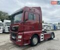 Красный МАН ТГКС, объемом двигателя 12.5 л и пробегом 940 тыс. км за 19500 $, фото 1 на Automoto.ua