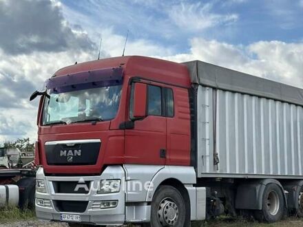 Красный МАН ТГКС, объемом двигателя 10.52 л и пробегом 857 тыс. км за 18502 $, фото 1 на Automoto.ua