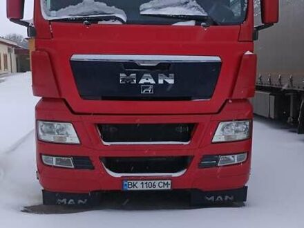 Красный МАН ТГКС, объемом двигателя 10.52 л и пробегом 984 тыс. км за 16000 $, фото 1 на Automoto.ua