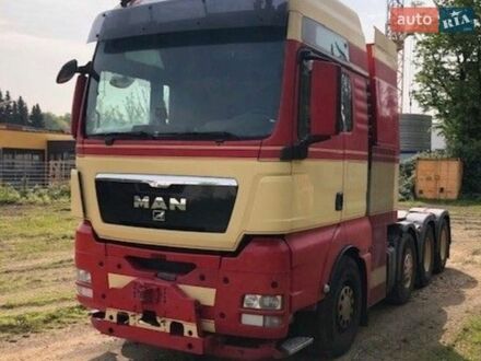 Красный МАН ТГКС, объемом двигателя 12.5 л и пробегом 400 тыс. км за 55459 $, фото 1 на Automoto.ua