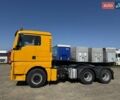 Желтый МАН ТГКС, объемом двигателя 12.42 л и пробегом 854 тыс. км за 24500 $, фото 1 на Automoto.ua