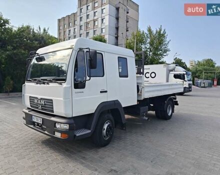 Белый МАН LE 2000, объемом двигателя 4.58 л и пробегом 320 тыс. км за 19000 $, фото 2 на Automoto.ua