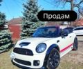 Белый Мини Кабриолет, объемом двигателя 1.6 л и пробегом 125 тыс. км за 9999 $, фото 1 на Automoto.ua