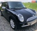Черный Мини Купер, объемом двигателя 1.6 л и пробегом 200 тыс. км за 4100 $, фото 1 на Automoto.ua