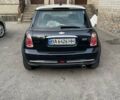 Черный Мини Купер, объемом двигателя 1.6 л и пробегом 238 тыс. км за 6499 $, фото 5 на Automoto.ua