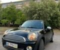 Черный Мини Купер, объемом двигателя 1.4 л и пробегом 150 тыс. км за 6300 $, фото 1 на Automoto.ua