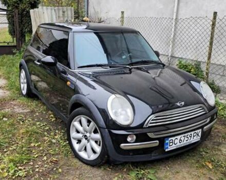 Черный Мини Купер, объемом двигателя 1.6 л и пробегом 125 тыс. км за 4500 $, фото 1 на Automoto.ua