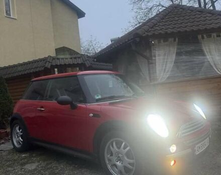 Красный Мини Купер, объемом двигателя 1.4 л и пробегом 230 тыс. км за 3900 $, фото 1 на Automoto.ua