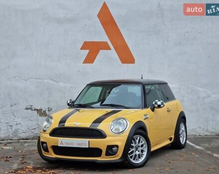 Желтый Мини Купер, объемом двигателя 1.6 л и пробегом 201 тыс. км за 6990 $, фото 7 на Automoto.ua
