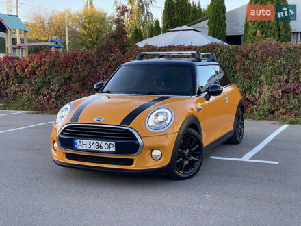 Помаранчевий Міні Cooper, об'ємом двигуна 1.5 л та пробігом 128 тис. км за 13300 $, фото 1 на Automoto.ua
