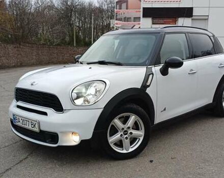 Белый Мини Кантримен, объемом двигателя 1.6 л и пробегом 209 тыс. км за 10400 $, фото 1 на Automoto.ua
