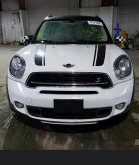 Белый Мини Кантримен, объемом двигателя 1.6 л и пробегом 196 тыс. км за 2500 $, фото 1 на Automoto.ua