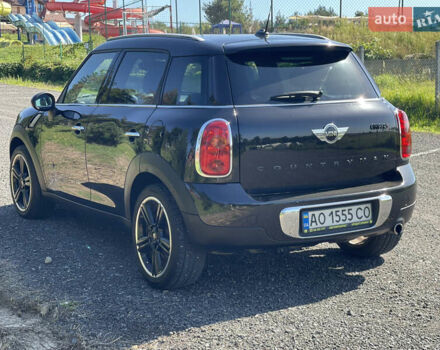 Мини Кантримен 2010 в Ужгороде на Automoto.ua Черный Мини Кантримен, объемом двигателя 1.6 л и пробегом 245 тыс. км за 7630 $, фото 27 на Automoto.ua