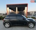 Черный Мини Кантримен, объемом двигателя 1.6 л и пробегом 252 тыс. км за 9500 $, фото 1 на Automoto.ua