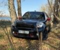 Черный Мини Кантримен, объемом двигателя 1.6 л и пробегом 116 тыс. км за 9900 $, фото 1 на Automoto.ua