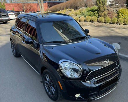 Черный Мини Кантримен, объемом двигателя 1.6 л и пробегом 143 тыс. км за 11900 $, фото 1 на Automoto.ua