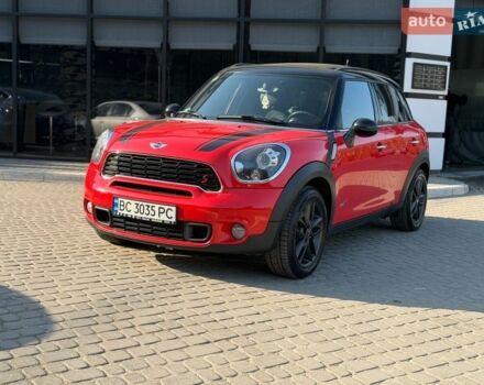 Красный Мини Кантримен, объемом двигателя 1.6 л и пробегом 218 тыс. км за 12000 $, фото 1 на Automoto.ua