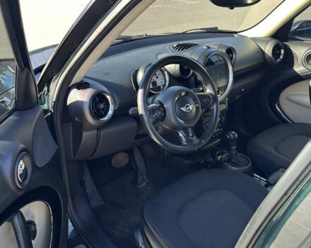 Зелений Міні Кантрімен, об'ємом двигуна 2 л та пробігом 99 тис. км за 11999 $, фото 11 на Automoto.ua