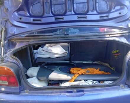 Фиолетовый Мазда 121, объемом двигателя 0 л и пробегом 250 тыс. км за 592 $, фото 2 на Automoto.ua