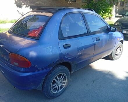 Фиолетовый Мазда 121, объемом двигателя 0 л и пробегом 250 тыс. км за 592 $, фото 5 на Automoto.ua