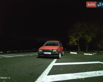 Красный Мазда 121, объемом двигателя 1.3 л и пробегом 290 тыс. км за 850 $, фото 2 на Automoto.ua