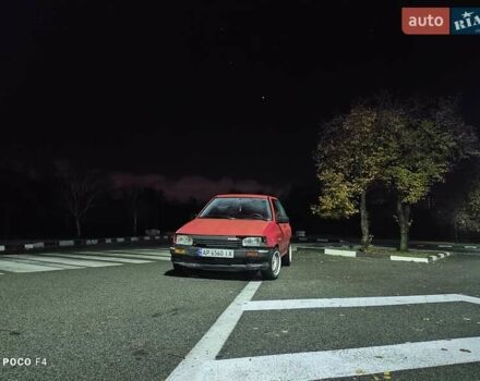 Красный Мазда 121, объемом двигателя 1.3 л и пробегом 290 тыс. км за 850 $, фото 1 на Automoto.ua