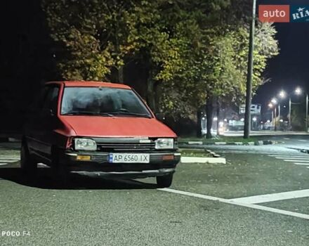 Красный Мазда 121, объемом двигателя 1.3 л и пробегом 290 тыс. км за 850 $, фото 3 на Automoto.ua