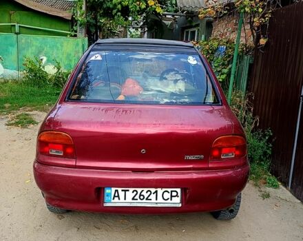 Красный Мазда 121, объемом двигателя 1.3 л и пробегом 405 тыс. км за 900 $, фото 2 на Automoto.ua