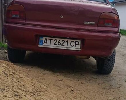 Красный Мазда 121, объемом двигателя 1.3 л и пробегом 300 тыс. км за 1200 $, фото 4 на Automoto.ua