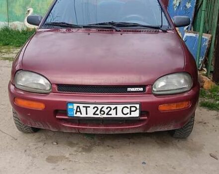 Красный Мазда 121, объемом двигателя 1.3 л и пробегом 300 тыс. км за 1200 $, фото 2 на Automoto.ua