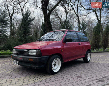 Красный Мазда 121, объемом двигателя 1.32 л и пробегом 150 тыс. км за 750 $, фото 1 на Automoto.ua