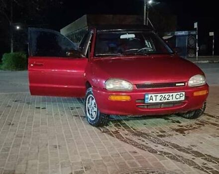 Красный Мазда 121, объемом двигателя 1.3 л и пробегом 300 тыс. км за 1200 $, фото 1 на Automoto.ua