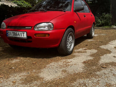 Красный Мазда 121, объемом двигателя 1.3 л и пробегом 222 тыс. км за 1650 $, фото 1 на Automoto.ua