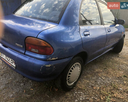 Мазда 121, об'ємом двигуна 1.3 л та пробігом 173 тис. км за 1100 $, фото 17 на Automoto.ua