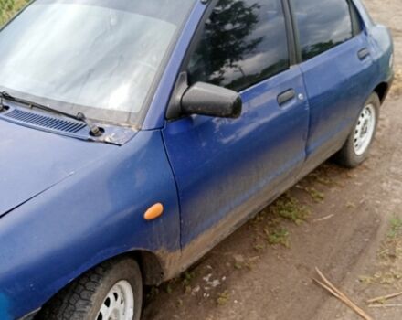 Синій Мазда 121, об'ємом двигуна 0 л та пробігом 200 тис. км за 400 $, фото 3 на Automoto.ua