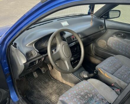 Синій Мазда 121, об'ємом двигуна 1.3 л та пробігом 347 тис. км за 999 $, фото 3 на Automoto.ua