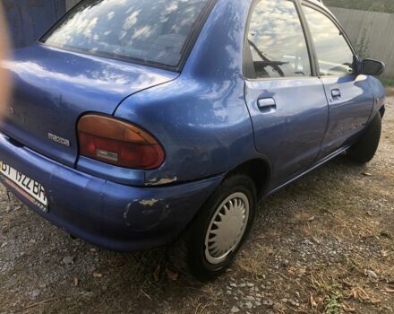 Синий Мазда 121, объемом двигателя 1.3 л и пробегом 173 тыс. км за 1025 $, фото 6 на Automoto.ua