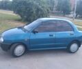 Синій Мазда 121, об'ємом двигуна 1.3 л та пробігом 240 тис. км за 2100 $, фото 1 на Automoto.ua