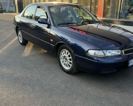 Синий Мазда 121, объемом двигателя 2 л и пробегом 380 тыс. км за 2900 $, фото 4 на Automoto.ua