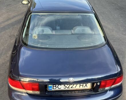Синий Мазда 121, объемом двигателя 2 л и пробегом 380 тыс. км за 2900 $, фото 1 на Automoto.ua