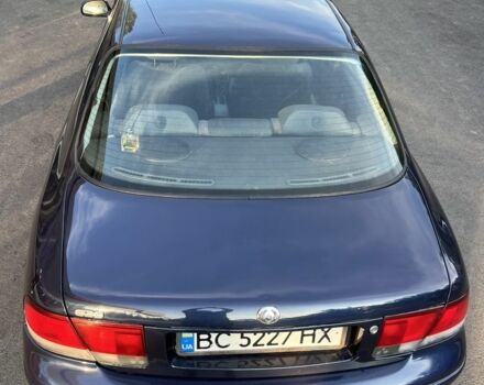 Синий Мазда 121, объемом двигателя 2 л и пробегом 380 тыс. км за 2900 $, фото 2 на Automoto.ua