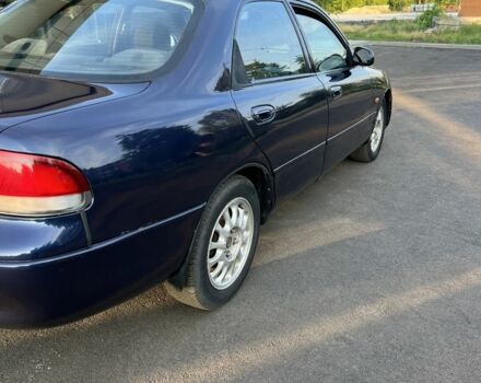 Синий Мазда 121, объемом двигателя 2 л и пробегом 380 тыс. км за 2900 $, фото 6 на Automoto.ua