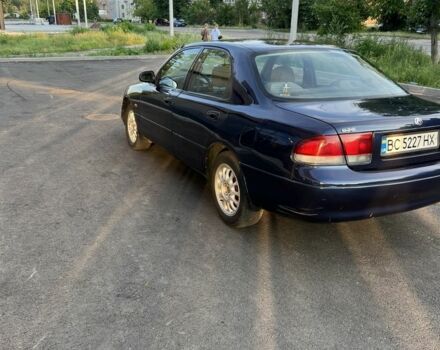 Синий Мазда 121, объемом двигателя 2 л и пробегом 380 тыс. км за 2900 $, фото 5 на Automoto.ua