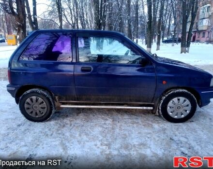 Синій Мазда 121, об'ємом двигуна 1.3 л та пробігом 152 тис. км за 1450 $, фото 1 на Automoto.ua