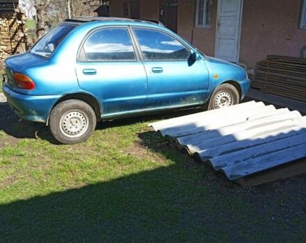 Синій Мазда 121, об'ємом двигуна 1 л та пробігом 406 тис. км за 1350 $, фото 1 на Automoto.ua